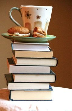 Cup of tea on top of books